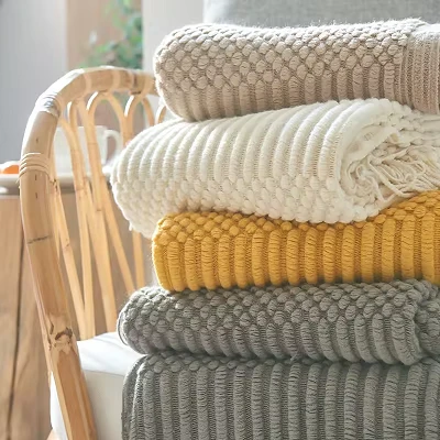 Couverture de tissage en tricot